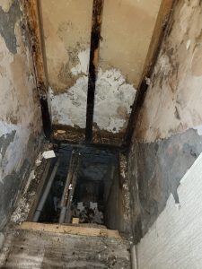 Bathroom Renovation - Clearing out the damp floor.